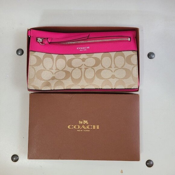 Coach Handbags - NWOT COACH Vintage Signature Logo Leather Canvas Wristlet Wallet Khaki Pink